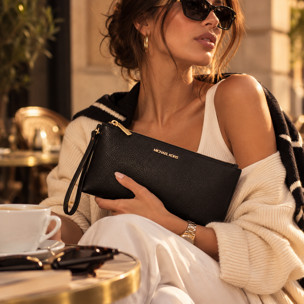Pochette in pelle nera - Oro